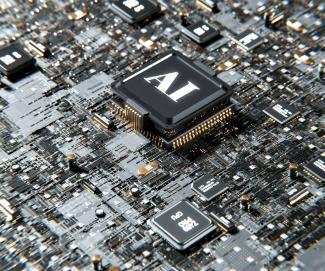 a computer chip with the letter a on top of it by Igor Omilaev courtesy of Unsplash.